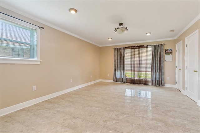 spare room with crown molding