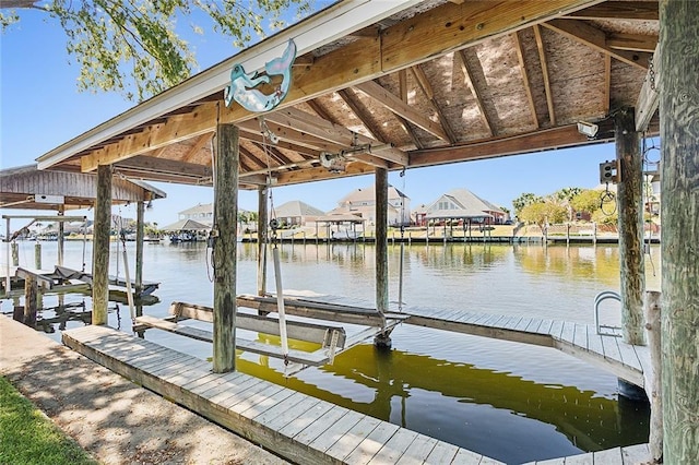 dock area featuring a water view