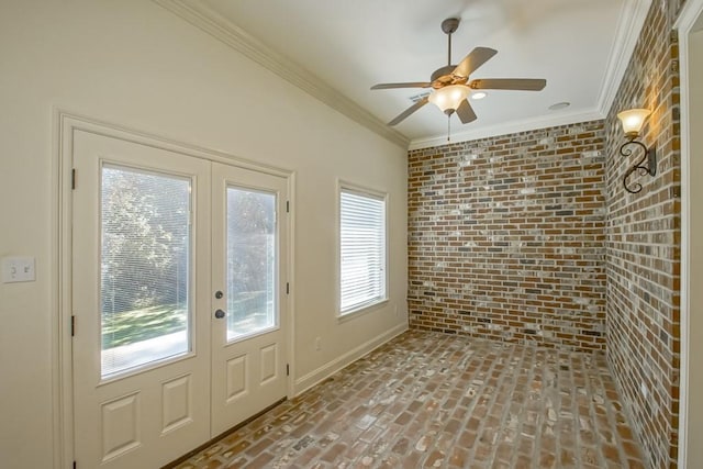 interior space with ceiling fan, brick floor, french doors, and brick wall