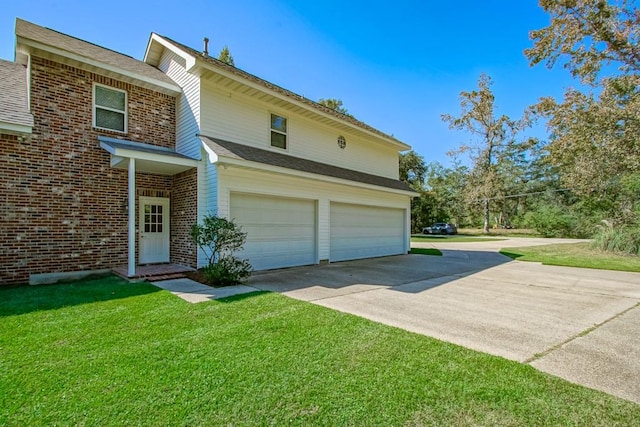 view of property exterior with a garage and a lawn