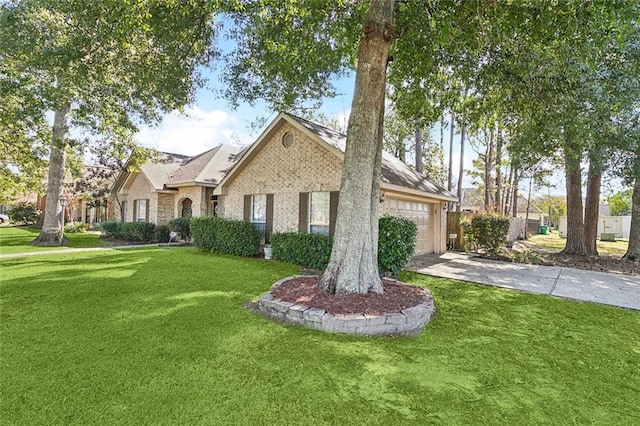 view of front of house featuring a garage and a front lawn