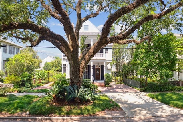 view of front of home with a balcony