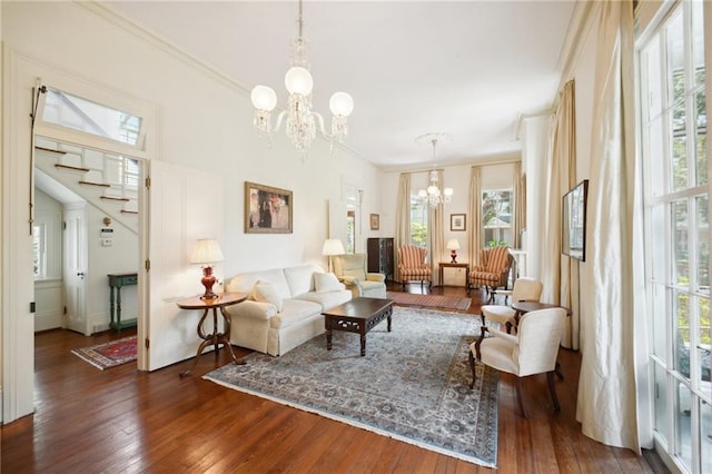 living room featuring dark hardwood / wood-style floors and a wealth of natural light