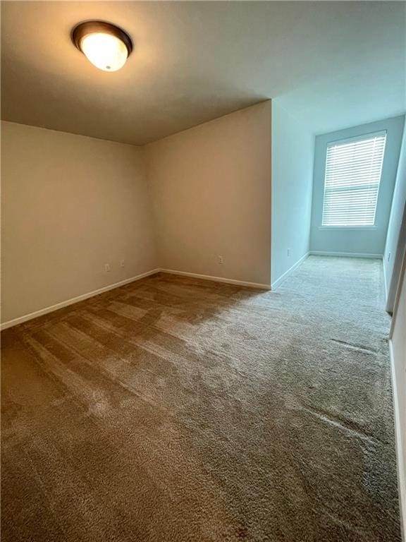 spare room with carpet flooring