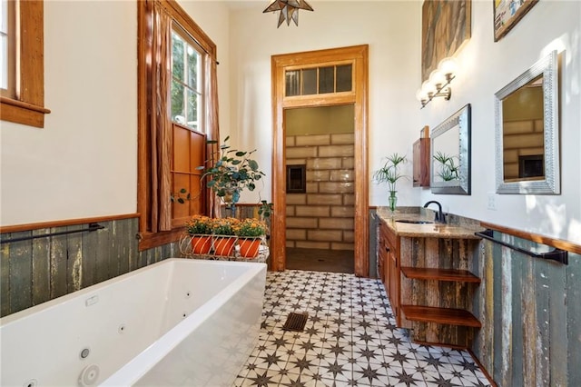 bathroom featuring vanity and a bathing tub