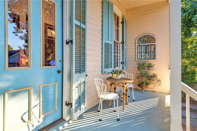 balcony featuring a porch