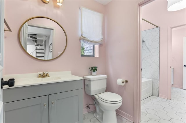 full bathroom with toilet, tiled shower / bath combo, vanity, and tile patterned flooring