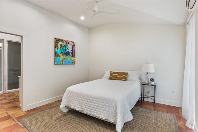 bedroom featuring vaulted ceiling, tile patterned flooring, and ceiling fan