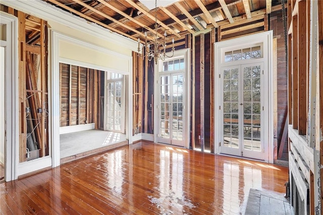 misc room with french doors and hardwood / wood-style floors