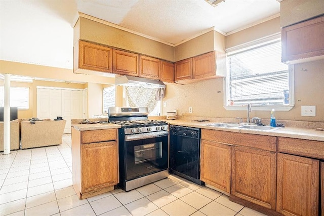 kitchen with gas range, black dishwasher, ornamental molding, sink, and light tile patterned floors