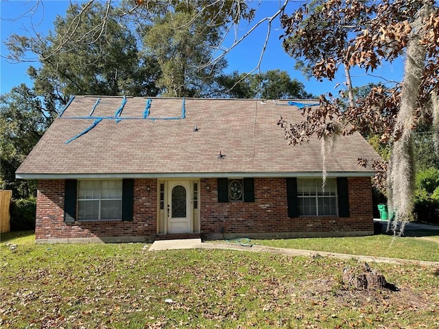 view of front of home with a front lawn