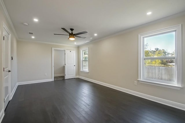 empty room with ornamental molding, dark wood-type flooring, and ceiling fan