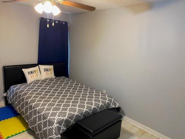 bedroom featuring ceiling fan