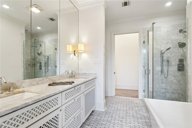 bathroom featuring vanity, crown molding, and a shower with door