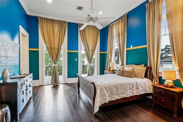 bedroom featuring dark hardwood / wood-style flooring, access to outside, ceiling fan, and crown molding