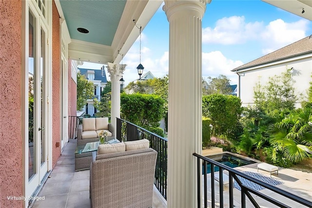 balcony featuring an outdoor hangout area