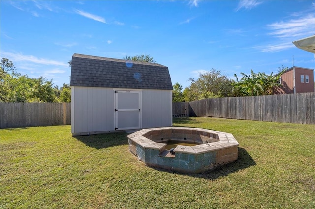 view of yard with a storage unit