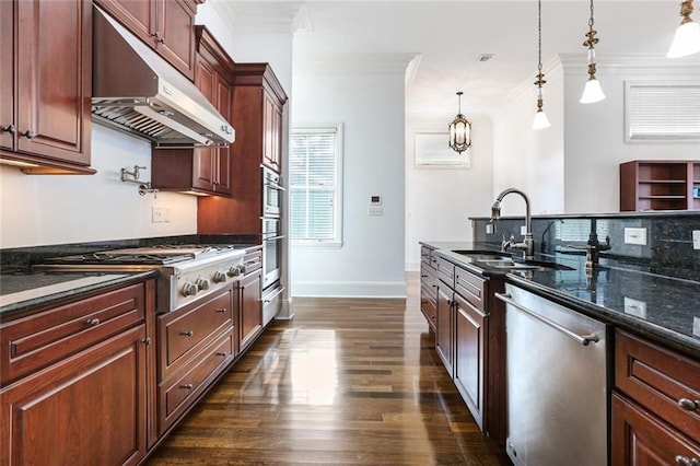 kitchen featuring sink, hanging light fixtures, stainless steel appliances, ornamental molding, and dark hardwood / wood-style floors