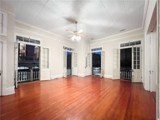 unfurnished living room with ornamental molding, hardwood / wood-style flooring, and ceiling fan