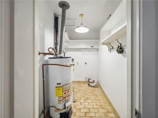 utility room with gas water heater