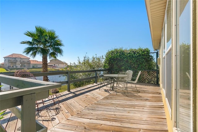 dock area with a water view