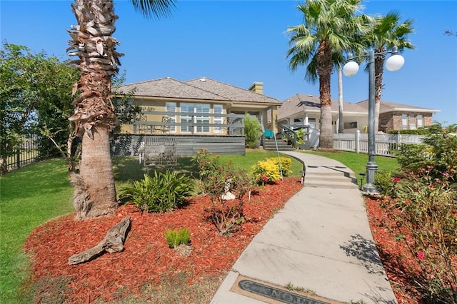 view of front of home with a front yard