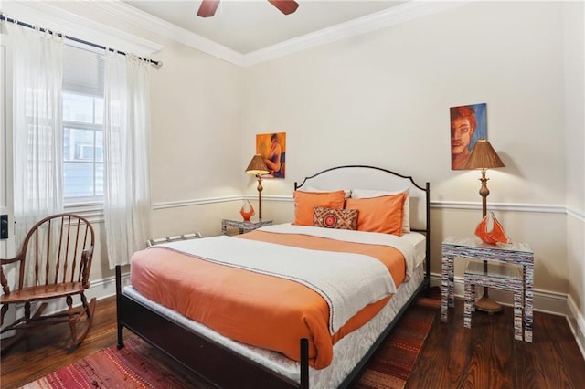 bedroom with ceiling fan, hardwood / wood-style flooring, and crown molding