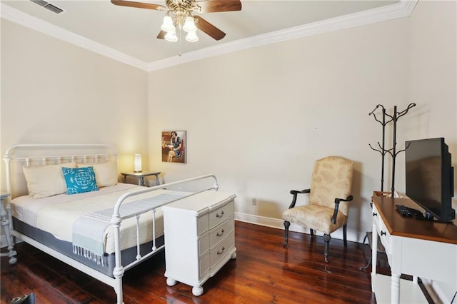 bedroom featuring ornamental molding, dark hardwood / wood-style floors, and ceiling fan