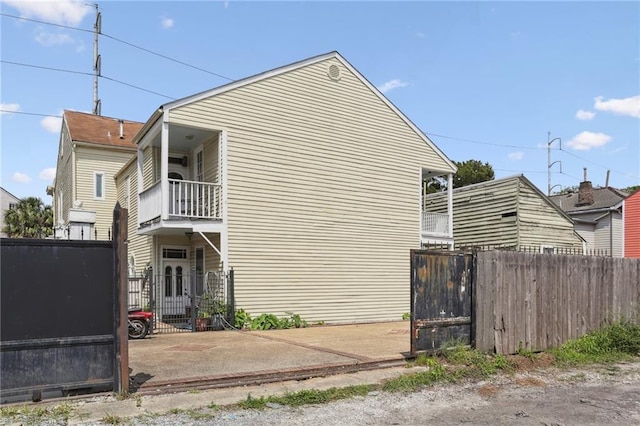 1214 Felicity St, New Orleans, LA 70130 - view of home's exterior with a balcony