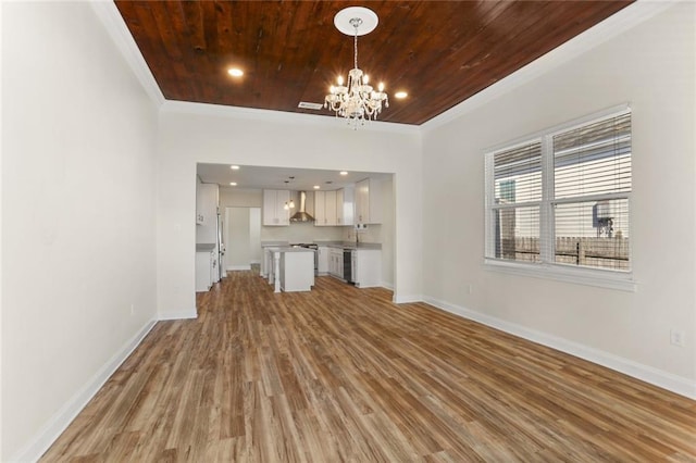 unfurnished living room with ornamental molding, a chandelier, hardwood / wood-style flooring, and wooden ceiling