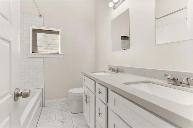 full bathroom featuring toilet, tiled shower / bath combo, and vanity