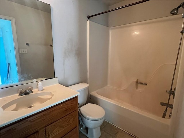 full bathroom with  shower combination, vanity, toilet, and tile patterned flooring