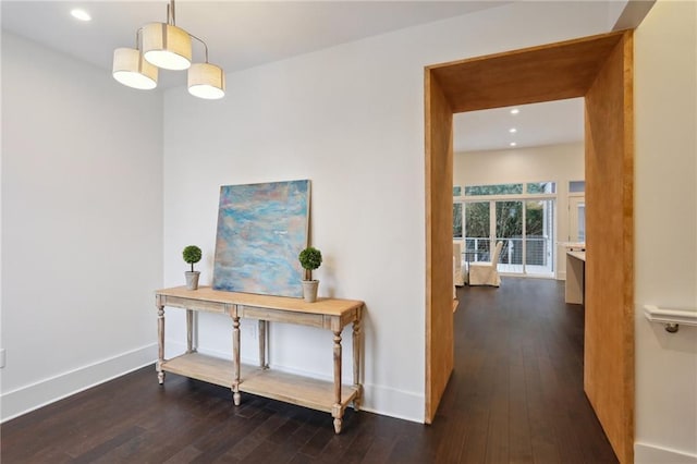 hall featuring dark wood-type flooring