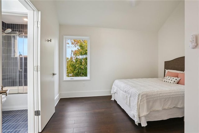 bedroom featuring dark hardwood / wood-style floors