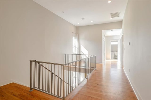 hallway featuring light hardwood / wood-style flooring