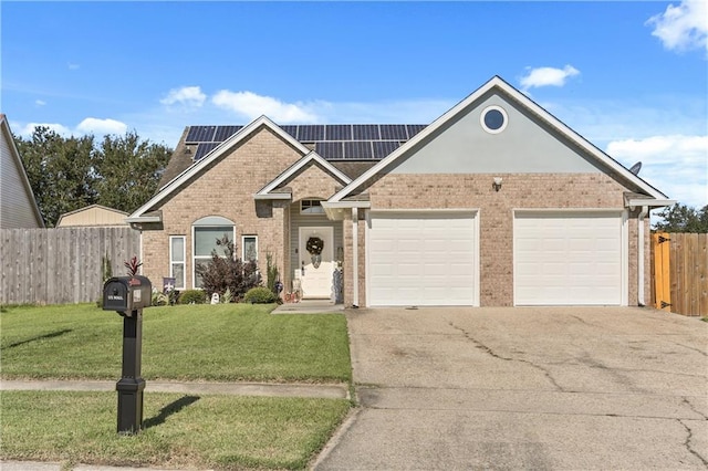 view of front facade with a garage and a front lawn