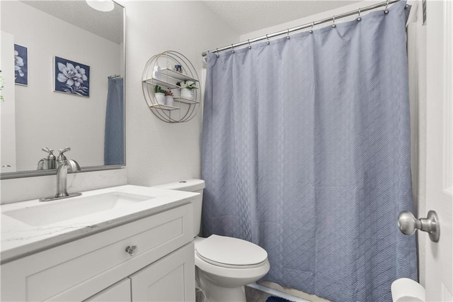 bathroom with vanity, a shower with shower curtain, a textured ceiling, and toilet