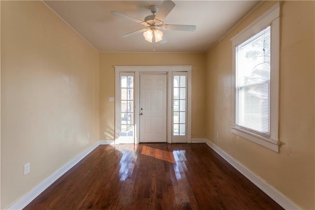 entryway featuring dark hardwood / wood-style flooring and ceiling fan