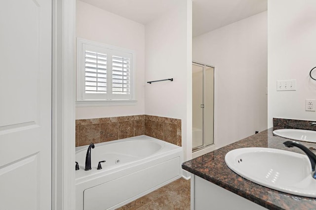 bathroom featuring tile patterned flooring, vanity, and independent shower and bath