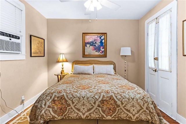 bedroom featuring a closet, hardwood / wood-style floors, and ceiling fan