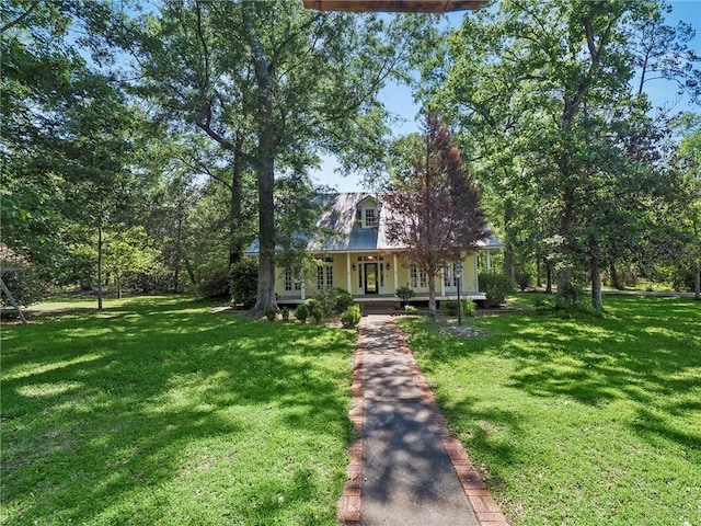 view of front of house with a porch and a front lawn