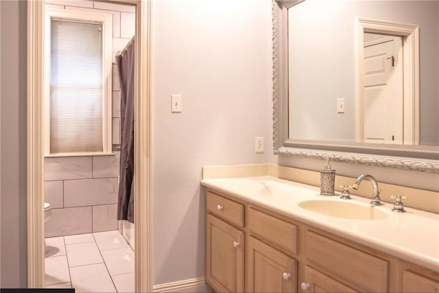 bathroom with vanity, a shower with shower curtain, toilet, and tile patterned flooring