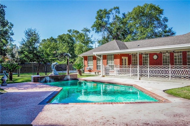 view of swimming pool featuring a patio