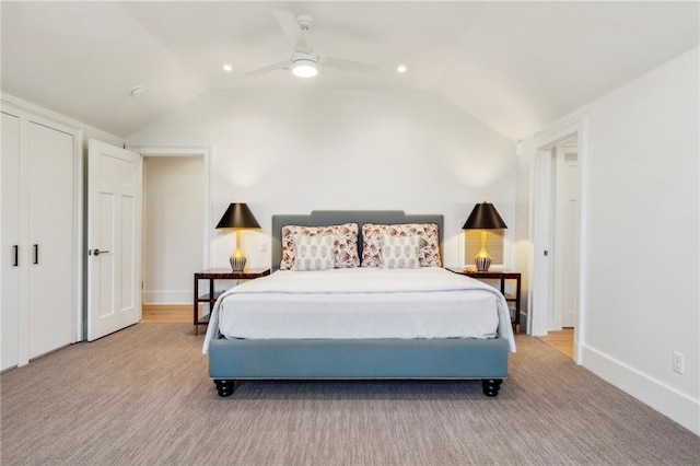 bedroom with baseboards, ceiling fan, and vaulted ceiling