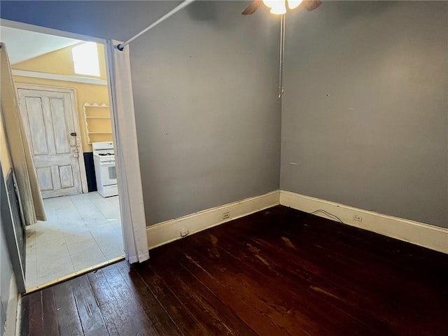 empty room featuring ceiling fan and wood-type flooring