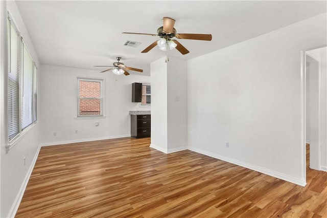 unfurnished living room featuring light hardwood / wood-style flooring