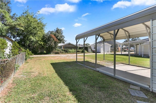 view of yard featuring a carport