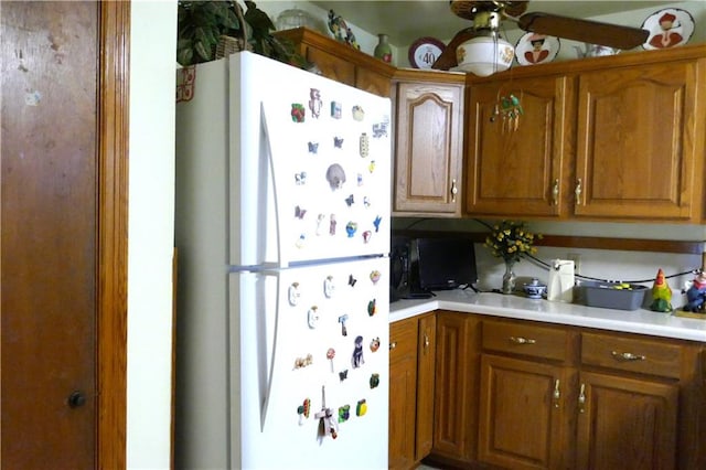 kitchen featuring white refrigerator