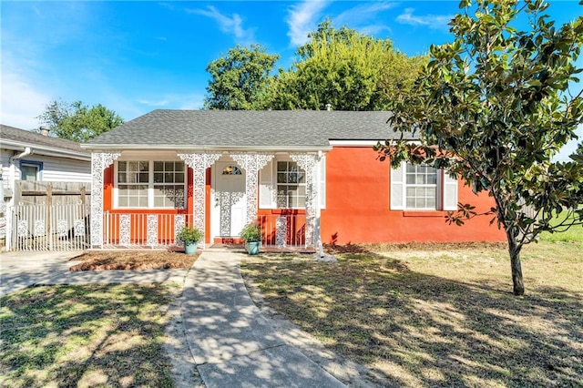 view of front of home featuring a porch and a front yard