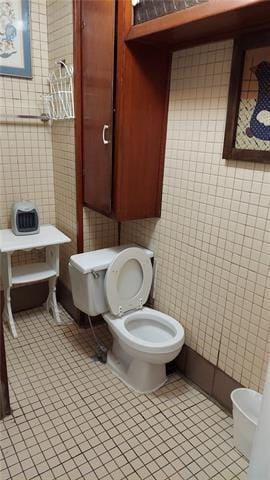 bathroom featuring tile patterned floors and toilet